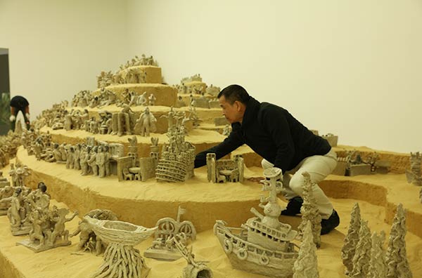 Farmer-turned-artist Hu Zhijun's clay figurines is among the exhibits on show in Doha. Farmer-turned-artist Hu Zhijun's clay figurines is among the exhibits on show in Doha.