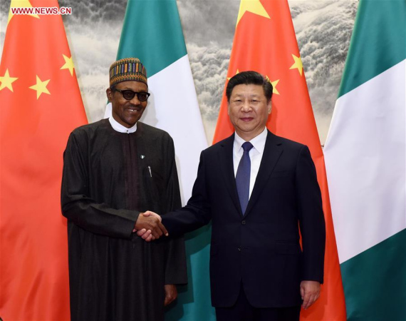  Chinese PresidentXi Jinping(R) holds talks with Nigerian President Muhammadu Buhari in Beijing, capital of China, April 12, 2016. (Photo: Xinhua/Rao Aimin) 
