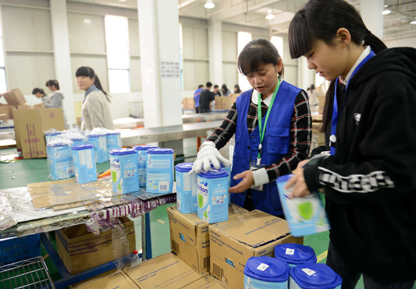 Foreign goods sold on Tmall, the online marketplace, being packed for shipment in China at the Hangzhou Cross-border Trade E-commerce Industrial Park. (Photo provided to China Daily)