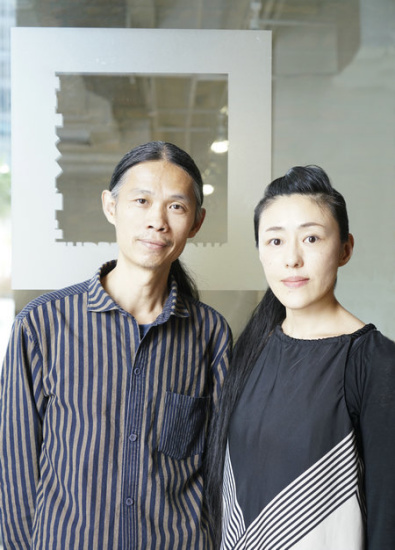 Chinese photographer Lu Zhirong and his wife Inri. (Photo provided to China Daily)