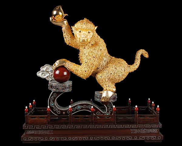 A zodiac monkey made using the filigree and inlay technique is among the museum's collections. (Photo provided to chinadaily.com.cn)