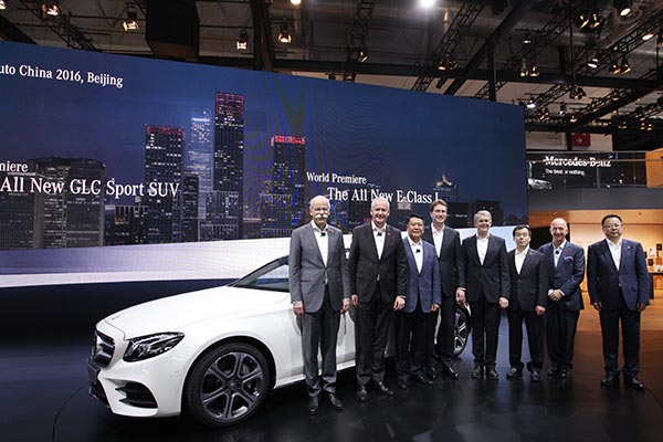 Executives from Daimler AG, BAIC, BMBS and BBAC jointly kick off the Mercedes-Benz' media day at Auto China 2016 in Beijing on Monday. Photo Provided to China Daily