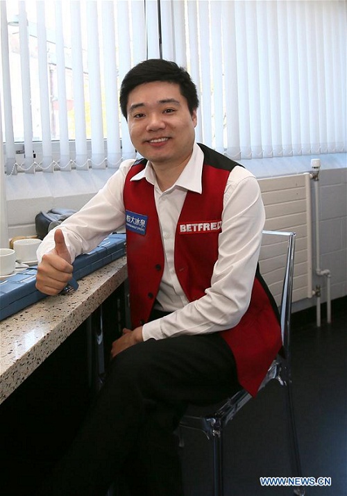 Ding Junhui of China poses for a photo in the dressing room after the semifinal match against Alan McManus of Scotland at the World Snooker Championship 2016 at the Crucible Theatre in Sheffield, England on April 30, 2016. Ding became the first Chinese finalist in the World Championship history after defeating Alan McManus 17-11. (Xinhua/Han Yan)