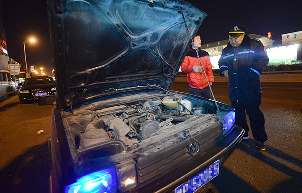 A private car is seized by transport authorities in February because its driver offered rides for payment and failed to provide the required licenses in Beijing.(Guo Qian/For China Daily)