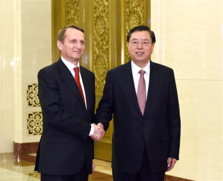 Zhang Dejiang (R), chairman of the Standing Committee of China's National People's Congress (NPC), shakes hands with Sergei Naryshkin, chairman of Russia's State Duma, in Beijing, capital of China, May 5, 2016. Zhang and Naryshkin co-chaired the second meeting of the cooperation committee between China's NPC, the top legislative body, and the Russian Federal Council and the State Duma, the upper and lower houses of the Russian parliament, in Beijing on Thursday. (Xinhua/Rao Aimin)