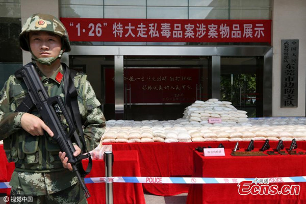 700kg of methamphetamine, guns and ammunitions seized by police are on display in Dongguang City, South Chinas Guangdong Province, May 5, 2016. (Photo/CFP)