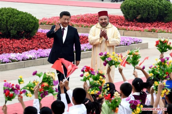 Chinese PresidentXi Jinping(L) holds a welcoming ceremony for King Mohammed VI of Morocco before their talks in Beijing, capital of China, May 11, 2016. (Photo: Xinhua/Rao Aimin)