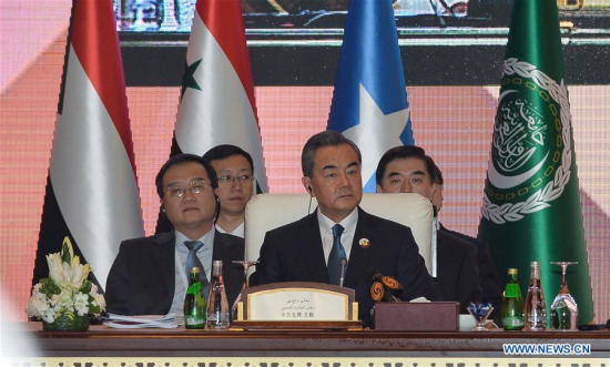 Chinese Foreign Minister Wang Yi (C) attends the opening of the seventh ministerial meeting of the China-Arab States Cooperation Forum in Doha, capital of Qatar, May 12, 2016. (Photo: Xinhua/Nikku)