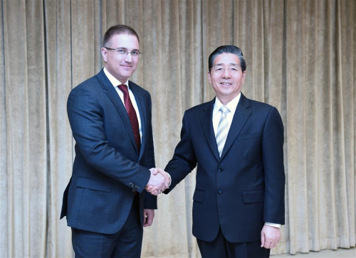 Chinese State Councilor and Minister of Public Security Guo Shengkun (R) meets with Serbian Interior Minister Nebojsa Stefanovic in Beijing, capital of China, May 16, 2016. (Photo: Xinhua/Zhang Ling)