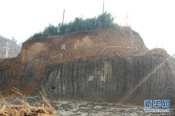 File photo of an excavation at a ditch surrounding the Liangzhu Culture settlement in Yuhang City, Zhejiang Province. (Photo/Xinhua)