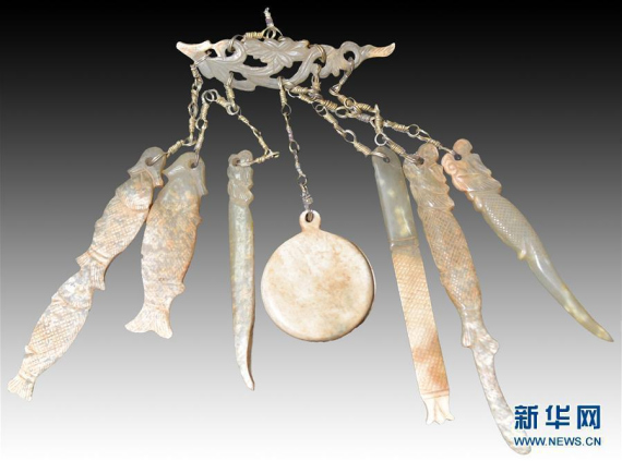 File photo of jade ornaments found at the Liao Dynasty Noble Consort tombs in Inner Mongolia Autonomous Region. (Photo/Xinhua)