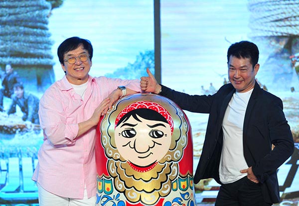 Jackie Chan and Yuen Biao are on stage to promote Chan's new film Skiptrace in Beijing on May 22. (Photo/China.org.cn)