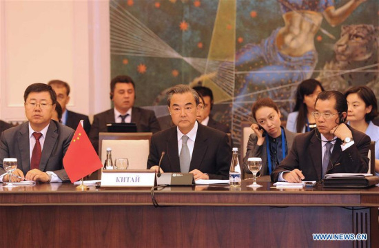 Chinese Foreign Minister Wang Yi (C, front) attends a meeting of the Shanghai Cooperation Organization (SCO) Council of Foreign Ministers in Tashkent, Uzbekistan, May 24, 2016. (Photo: Xinhua/Sadat)