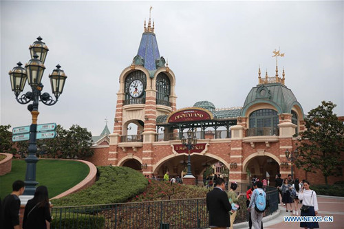 Photo taken on May 10, 2016 shows the front gate of the Disney Resort in Shanghai, east China. The Shanghai Disney Resort, Disney's first theme park on the Chinese mainland, started an internal test run Tuesday to prepare for its opening, scheduled for June 16. (Xinhua/Ren Long)