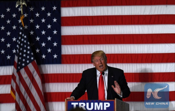 Republican presidential candidate Donald Trump speaks at a campaign rally in Cedar Rapids, Iowa, the United States, Feb. 1, 2016. (Photo: Xinhua/Yin Bogu)
