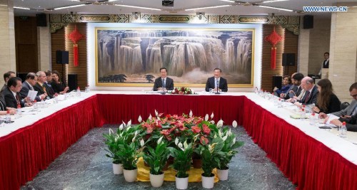 China's Permanent Representative to the United Nations Office at Geneva Ma Zhaoxu (center left) speaks during a meeting with delegates from missions and organizations in Geneva, Switzerland, May 27, 2016.  (Photo: Xinhua/Xu Jinquan)