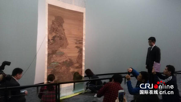 A painting, among the 36 most precious treasures of the museum, is on display at a press conference for the upcoming Int'l Museum Day. (Photo/cri.cn)