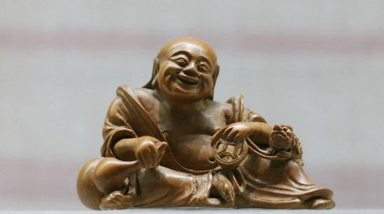 A buddha statue is among the exhibits at Beijing Art Museum. (Photo/bjartmuseum.com)