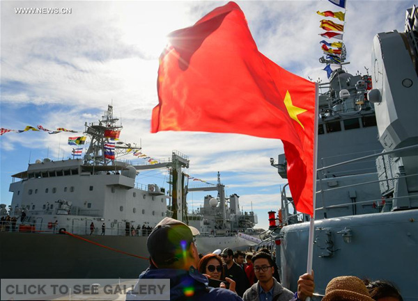 Local Chinese visit the Chinese naval guided missile destroyer Qingdao at Simon's Town, South Africa, May 16, 2016. (Photo: Xinhua/Zhai Jianlan)