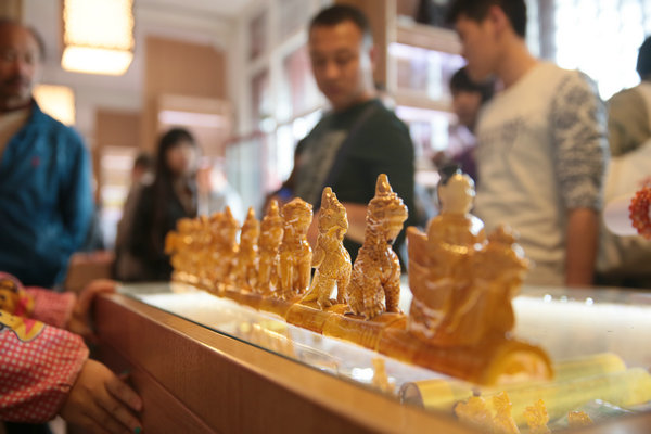 Tourists visit a souvenir shop in the Palace Museum in Beijing. (Photo provided to China Daily)