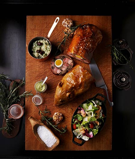 Jarrod Verbiak's porchetta, succulent inside with crispy crackling outside, is a work of culinary art. Provided to China Daily