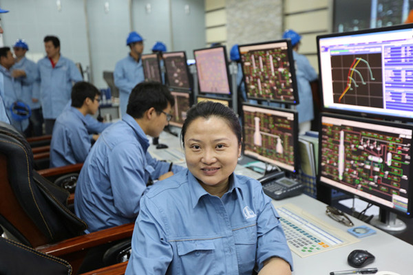 Kong Xinagjie from Xinjiang is a worker at Sinopec's Tahe Petrochemical Company, which is located in the Xinjiang Autonomous Region. Kong has been working at the company for 13 years. (Photo/CRIENGLISH.com)