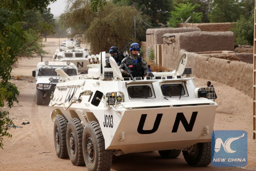 Chinese peacekeepers patrol in Gao, Mali, Feb. 2, 2014. (Photo: Xinhua/Yang Huawen)