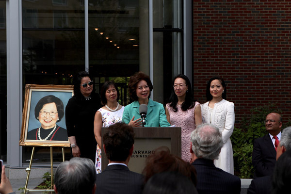 Elaine Chao (center), former US Secretary of Labor, speaks on behalf of her sisters at the dedication ceremony of the Ruth Mulan Chu Chao Center, which is named after their mother, on Monday at the Harvard Business School. (Photo by HEZI JIANG/China Daily)