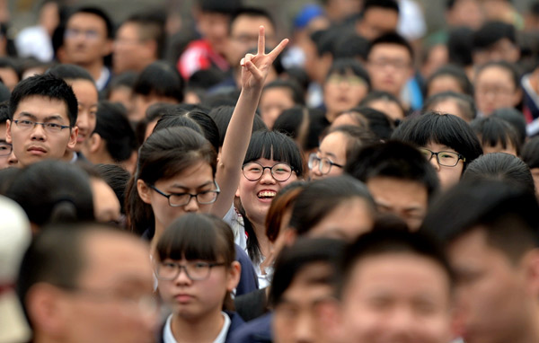 Students leave a gaokao venue in Xingtai, Hebei province, after their first exam on Tuesday. MU YU / XINHUA