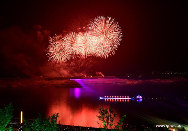 Photo taken on June 8, 2016 shows a firework concert held in Zigui County of central China's Hubei Province. Zigui is hometown of Qu Yuan, a patriotic poet who drowned himself before his state fell to the invasion of the enemy during the Warring States Period (475-221 BC). The firework concert was held here to commemorate him on Wednesday before the Duanwu Festival which falls on June 9 this year. (Xinhua/Wang Jiaman) 