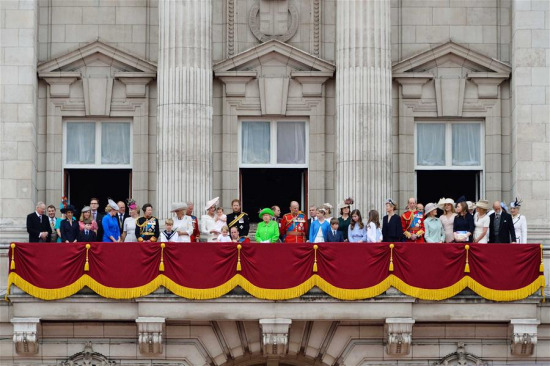 Members of the royal family view the fly-past on the balcony of Buckingham Palace during the Queen's 90th birthday celebrations in London, Britain on June 11, 2016. (Photo: Xinhua/Ray Tang)