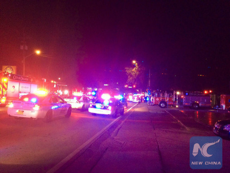 Photo provided by Orlando Police Department shows police cars and fire trucks gather outside the Pulse nightclub in Orlando, Florida, the United States, June 12, 2016. (Photo: Xinhua/Orlando Police Department)