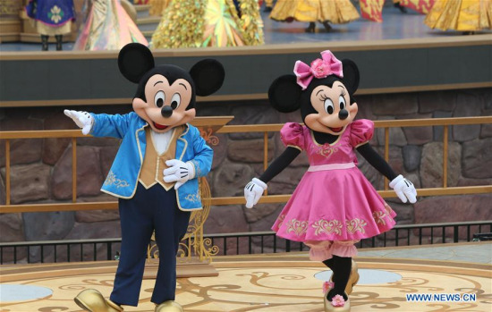 Mickey and Minnie are seen during a opening ceremony held in Shanghai Disney Resort in Shanghai, east China, June 16, 2016. The Shanghai Disney Resort, its 12th Disney resorts around the world, opened here on Thursday. (Xinhua/Ren Long)