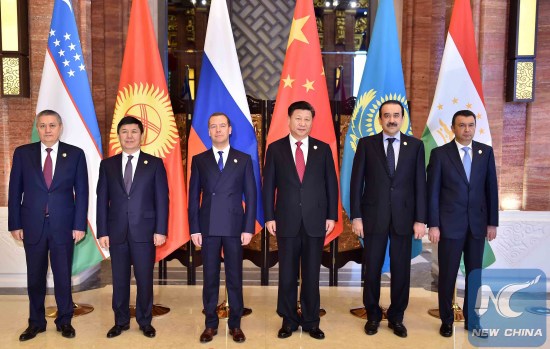 File Photo: Chinese President Xi Jinping (3rd R) meets with leaders of members of the Shanghai Cooperation Organization (SCO), in Wuzhen town, east China's Zhejiang Province, Dec. 16, 2015. (Xinhua/Li Tao)