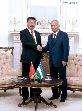  Chinese President Xi Jinping (L) holds talks with Uzbek President Islam Karimov in Tashkent, Uzbekistan, June 22, 2016. (Xinhua/Ma Zhancheng) 