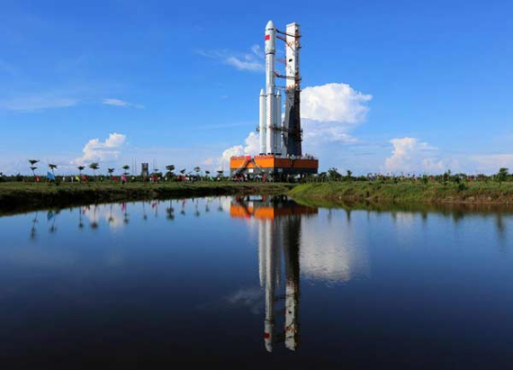 The Long March-7, a medium-sized rocket using liquid propellant, has been moved vertically to the launch pad after a three-hour transport from the test lab in Wenchang, South China's Hainan province, on June 22, 2016. Photo/Xinhua