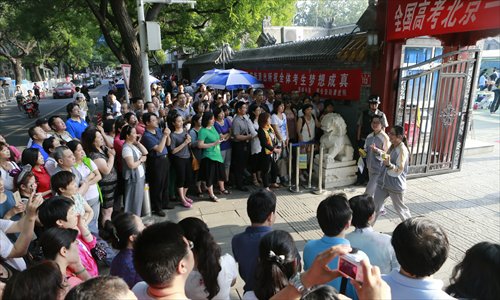 Students exit one of the test sites after finishing the gaokao in Beijing on June 8. More and more foreign universities are accepting gaokao scores for Chinese student enrollment. (Photo: Li Hao/GT)