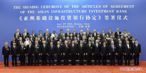 Chinese President Xi Jinping (9th R Front) meets with representatives of the prospective founding countries who attended the signing ceremony of the articles of the agreement of the Asian Infrastructure Investment Bank (AIIB) at the Great Hall of the People in Beijing, capital of China, June 29, 2015. (Photo: Xinhua/Lan Hongguang)