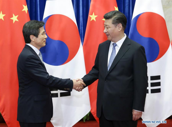 Chinese President Xi Jinping (R) meets with the Republic of Korea (ROK) Prime Minister Hwang Kyo-ahn in Beijing, capital of China, June 29, 2016. (Xinhua/Pang Xinglei)
