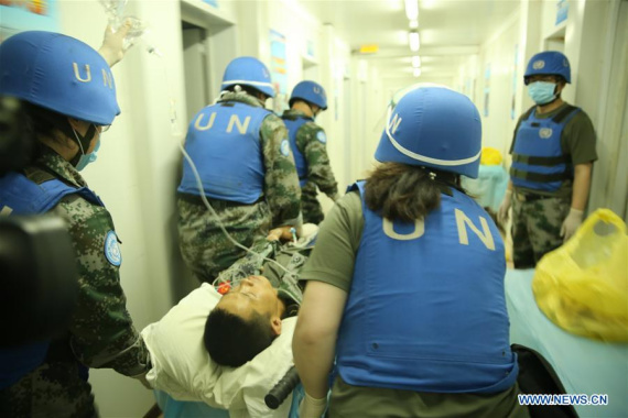 An injured Chinese peacekeeper is treated in Gao, Mali, May 31, 2016. A Chinese member of a United Nations mission in Mali was killed and four other Chinese peacekeepers were injured in a mortar or rocket attack, China's Embassy in Mali said Wednesday. (Photo: Xinhua/Zhao Ziquan)