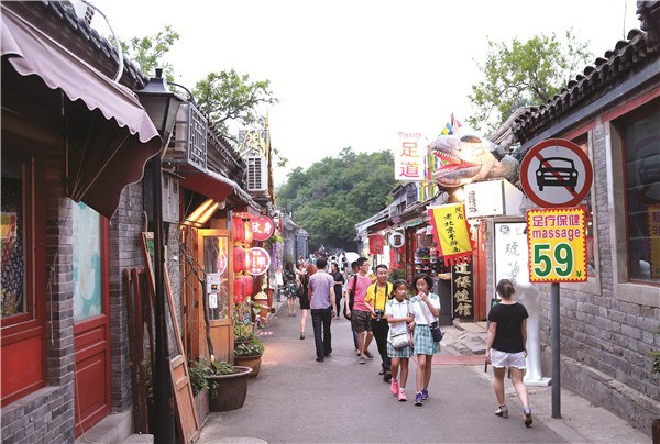 Nanluoguxiang, a 740-year-old hutong in Beijing, has become a popular destination for tourists.