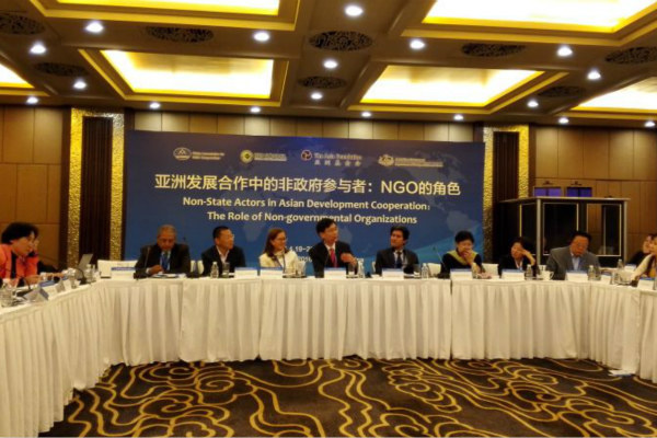Participants discuss NGO's role in Asian development cooperation during the seminar in Beijing, April 19, 2016. (Photo provided to chinadaily.com.cn)