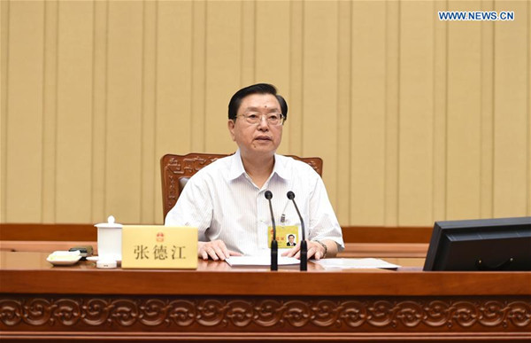 Zhang Dejiang, chairman of the Standing Committee of China's National People's Congress (NPC), presides over the closing meeting of the 21st session of the 12th NPC Standing Committee in Beijing, capital of China, July 2, 2016.(Xinhua/Xie Huanchi)