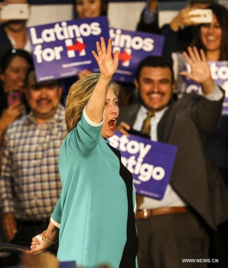  Democratic presidential candidate Hillary Clinton gestures as she campaigns at East Los Angeles College in Los Angeles, the United States, May 5, 2016. (Xinhua file photo/Zhao Hanrong)