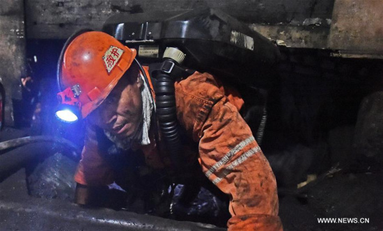 A rescuer works at the site of a coal mine in which a fire broke out in Benxi City, northeast China's Liaoning Province, July 5, 2016. (Xinhua/Yang Qing)