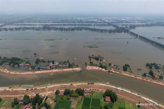 The dike breach site is seen in Huarong County, central China's Hunan Province, July 11, 2016. (Photo: Xinhua/Li Ga)