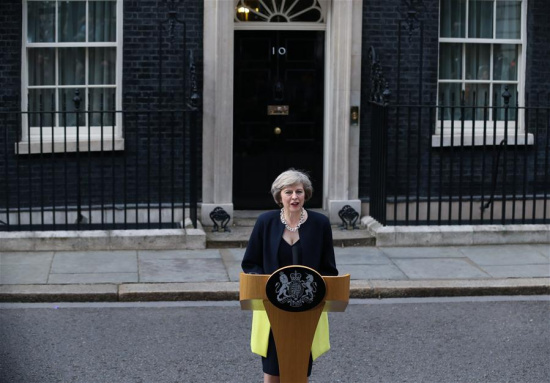 Britain's new Prime Minister Theresa May delivers a speech after arriving at 10 Downing Street in London, Britain on July 13, 2016. Britain's new Prime Minister Theresa May arrived at Downing Street on Wednesday after gaining consent from Queen Elizabeth II. (Xinhua/Han Yan)