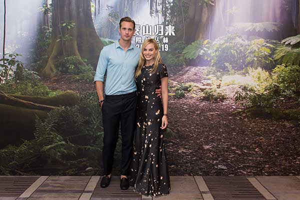 Alexander Skarsgard and Australian actress Margot Robbie meet Chinese fans in Beijing last week.(Photo provided to China Daily)
