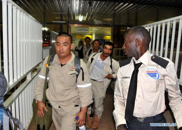 Chinese nationals evacuated from South Sudan leave the international airport of Khartoum, capital of Sudan, on July 15, 2016. Fifty-four Chinese nationals evacuated from the conflict-hit South Sudan and arrived in Khartoum of Sudan on Friday. (Xinhua/Li Ziheng)