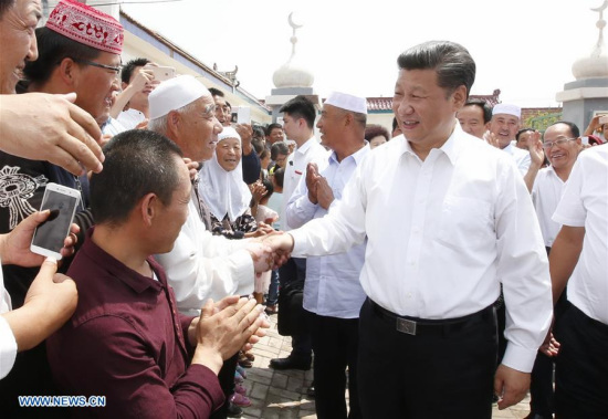 Chinese President Xi Jinping shakes hands with villagers at the Yuanlong Relocation Village of Minning Town in Yinchuan, capital of northwest China's Ningxia Hui Autonomous Region, July 19, 2016. (Xinhua/Ju Peng) 